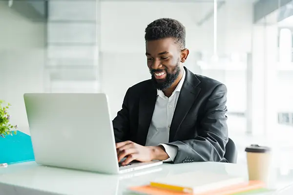 African-American businessman on computer